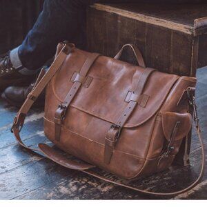 Whipping Post mens' all leather large messenger bag with buckle closure